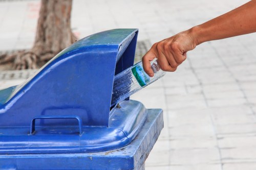 Residents disposing of household waste in West London