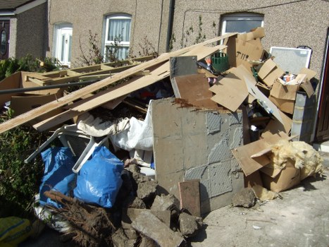 Residents sorting their waste for recycling